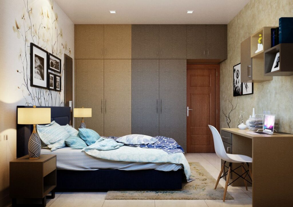 A modern bedroom with stylish decor, featuring a neatly arranged bed and contemporary furniture.